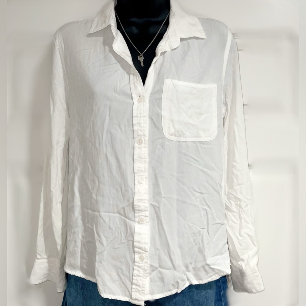 Women’s white long sleeve button down shirt.  Size XS